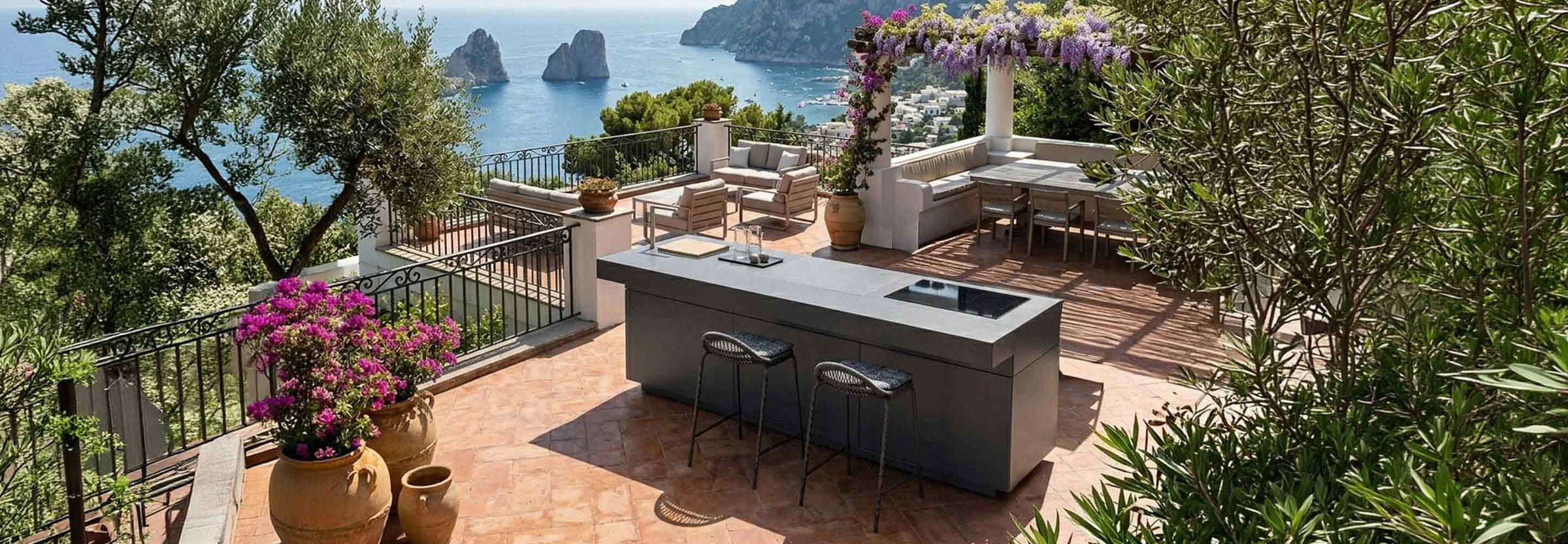 Luxurious open-air patio curated with high-end Italian outdoor sofas, architectural planters, and artistic vases.