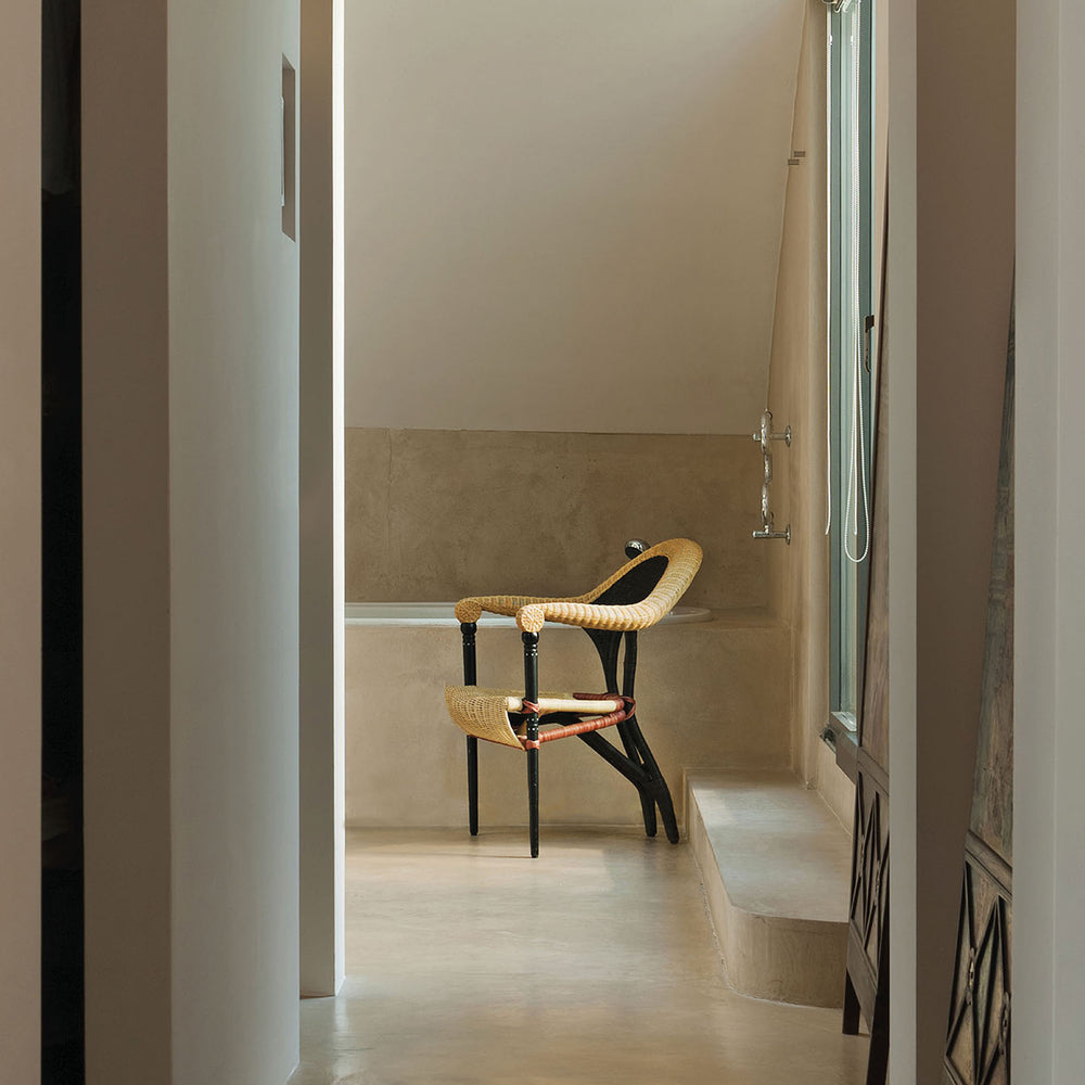 Liba rattan chair by Borek Sipek for Driade, sculptural designer seating in woven rattan.