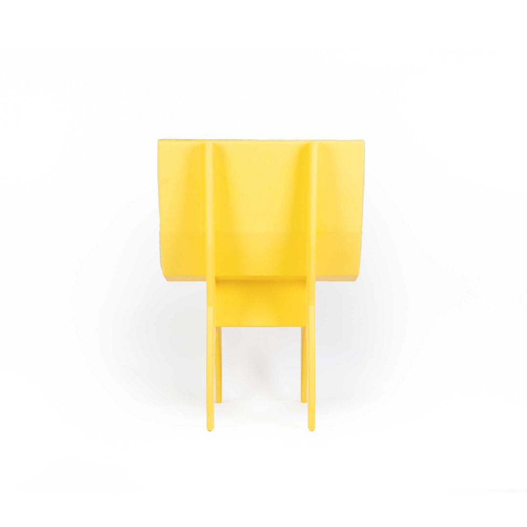 Calder Yellow chair by Jules Regis, bright yellow structure with soft cushions, contemporary designer seating.