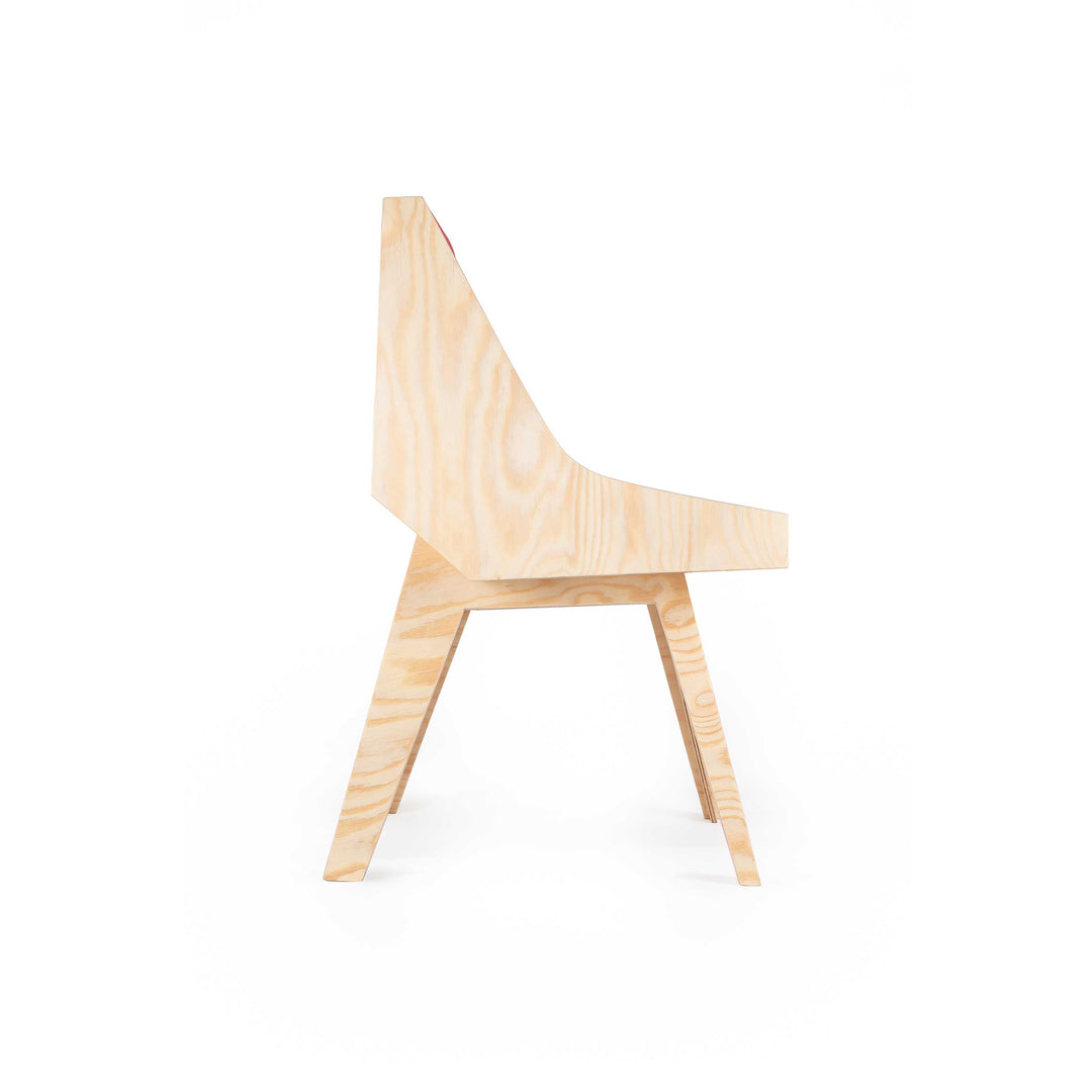 Cardillo Red chair by Jules Regis, phenolic CLT structure with red fabric upholstery, contemporary designer seating.