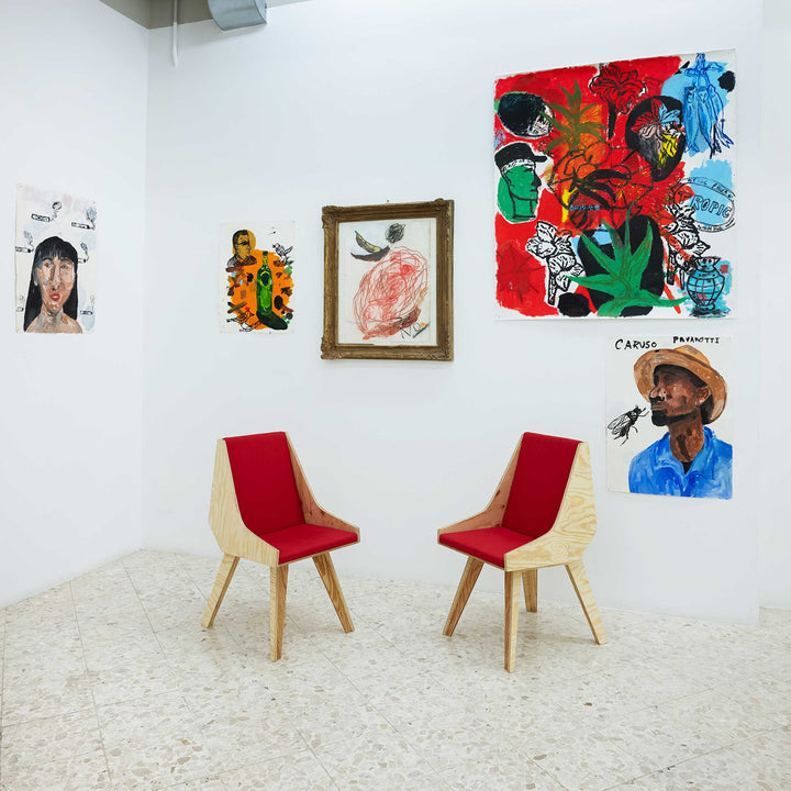 Cardillo Red chair by Jules Regis, phenolic CLT structure with red fabric upholstery, contemporary designer seating in a museum