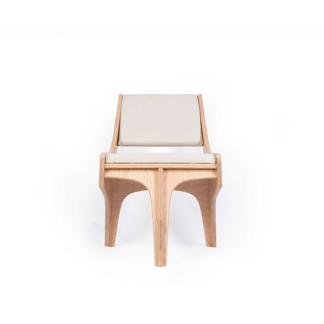 Falcone Cream chair by Jules Regis, oak wood structure with cream fabric upholstery, contemporary designer seating