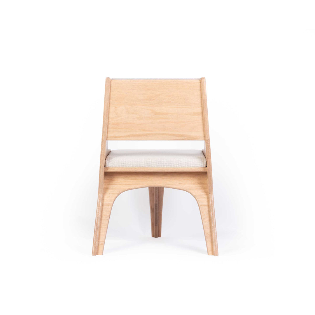 Falcone Cream chair by Jules Regis, oak wood structure with cream fabric upholstery, contemporary designer seating