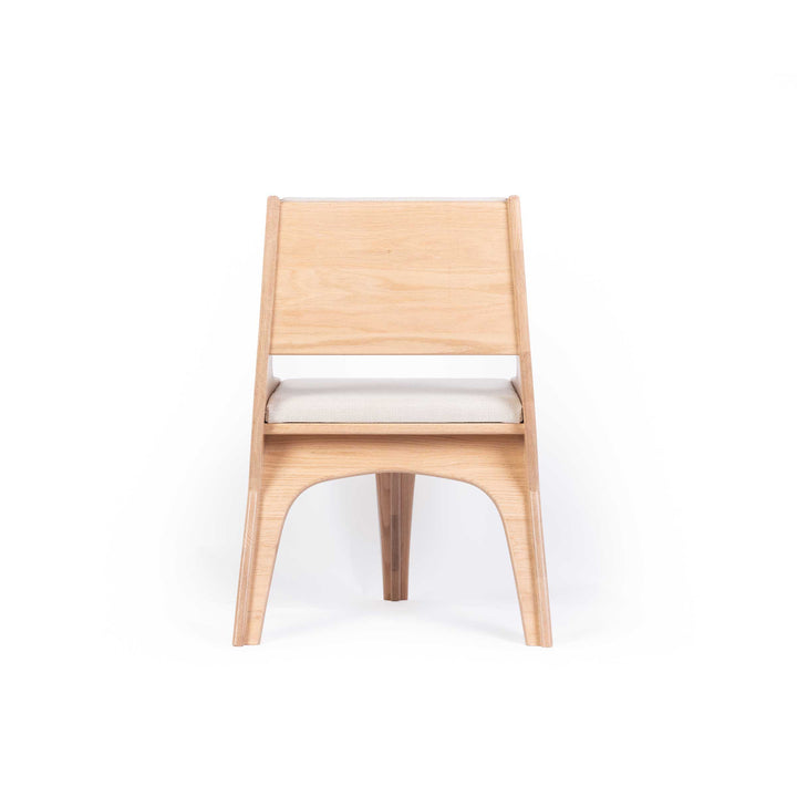 Falcone Cream chair by Jules Regis, oak wood structure with cream fabric upholstery, contemporary designer seating