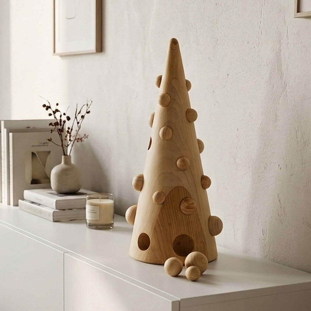 Xmas MN cone-shaped wooden Christmas tree with round wooden ornaments and circular cutouts, displayed on a white sideboard