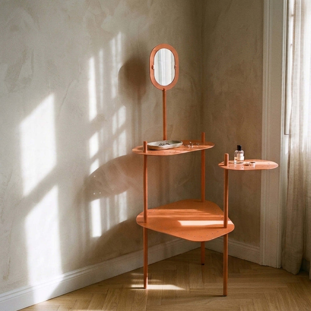 Giacopini BEA 06 melon dressing table with an oval mirror and staggered shelves beside a sunlit window