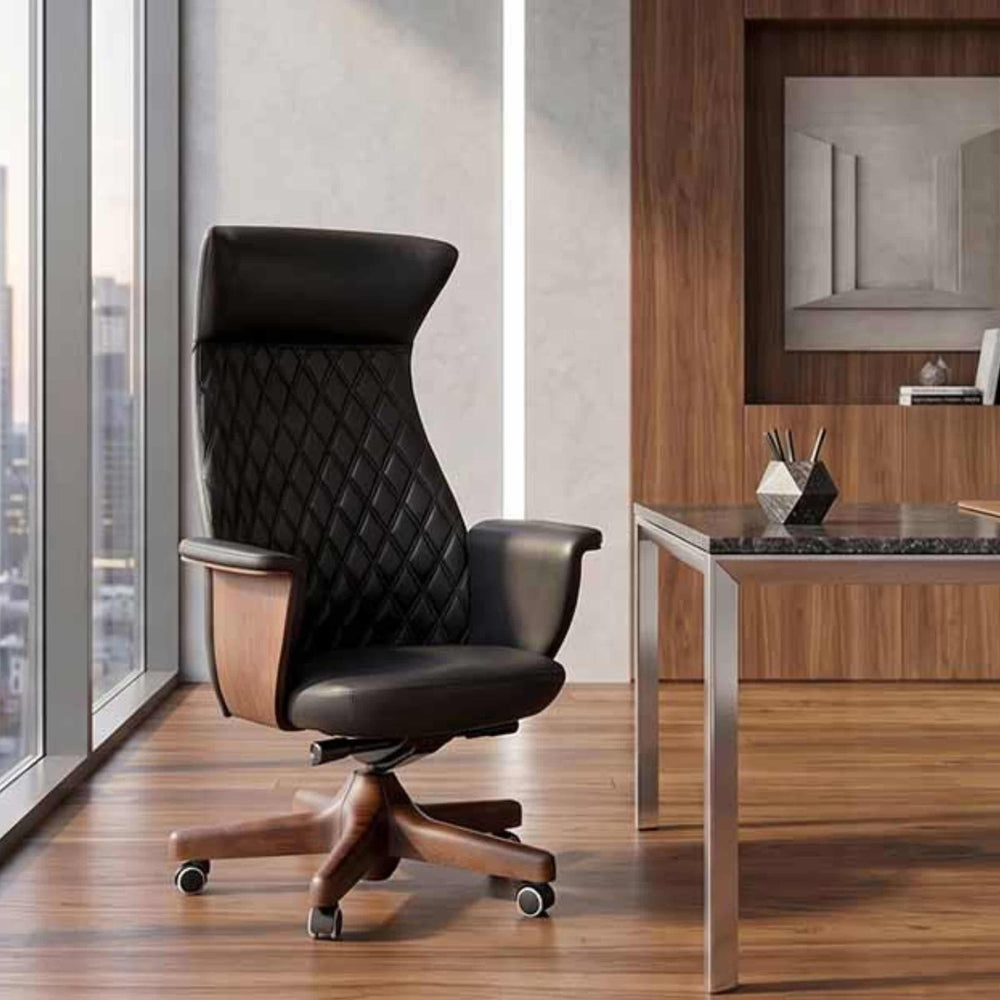 executive swivel chair charme by vigano next to a writing desk, in an office 