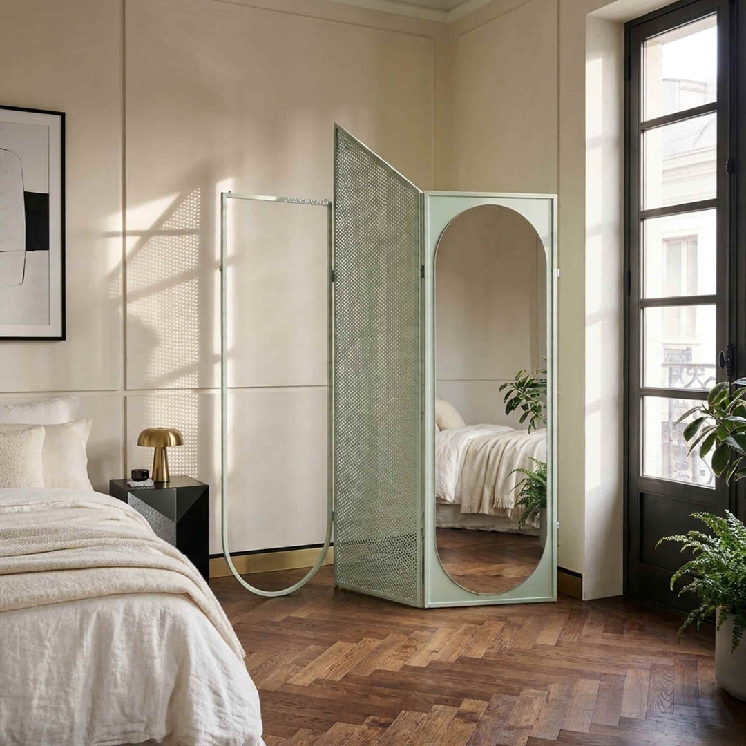 Giacopini DEJA-VU 03 mint room screen divider with a perforated panel and full-length mirror in a sunlit bedroom