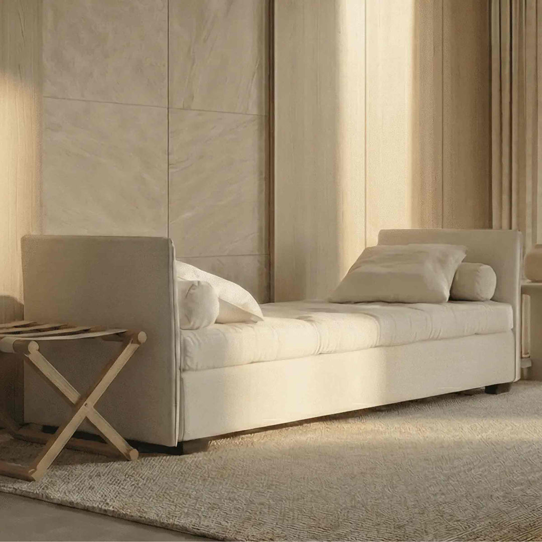 white Sofa Bed isoleuse by Orizzonti Design Center for Horm in a living room with cream tones