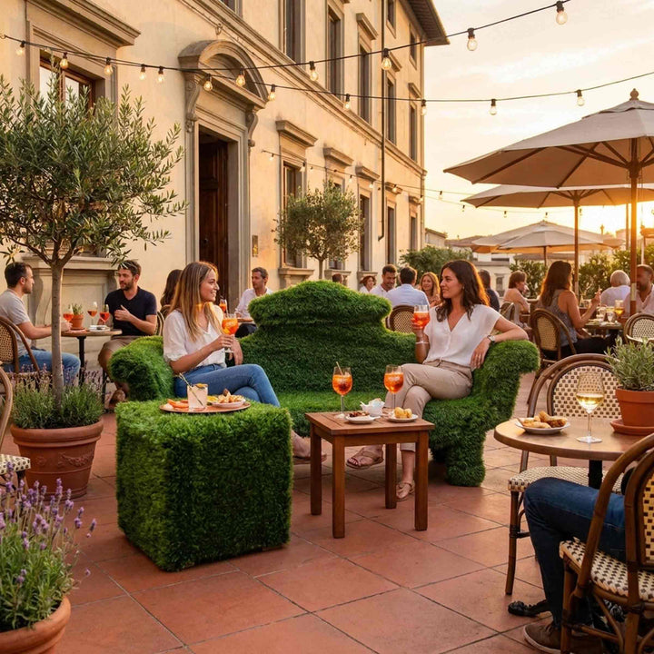 indoor and outdoor sofa sofagreen by 13ricrea with pouf qubo verde in a pub's patio