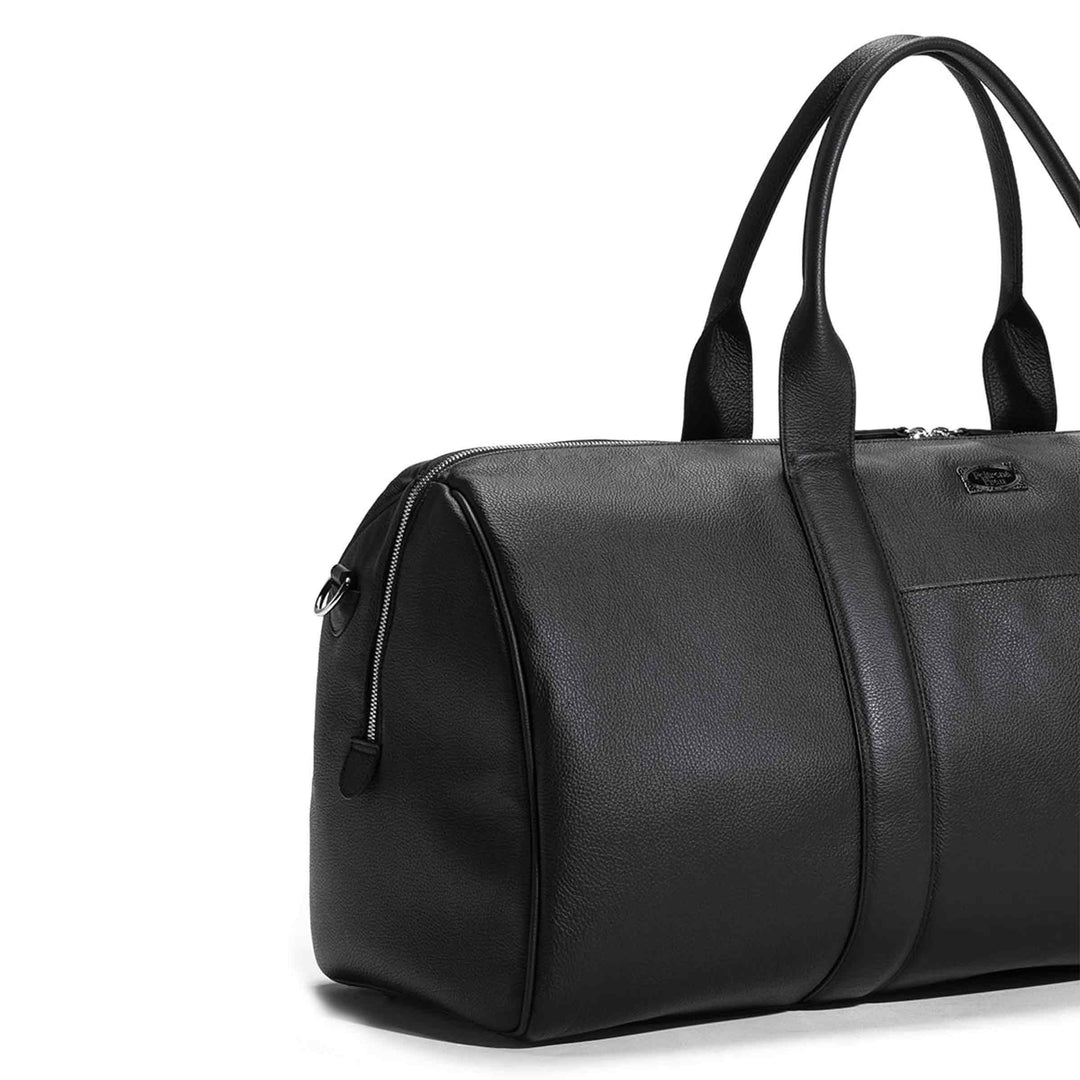 カルロッタ・フォルトゥーナによるPoltrona Frauのレザートラベルバッグ TRAVELLER'S COLLECTION