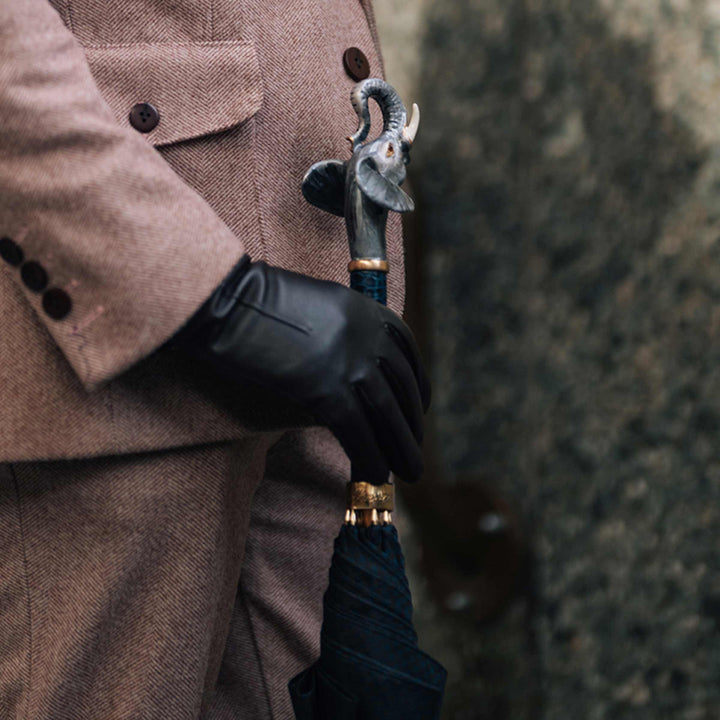 Elephant umbrella with enameled brass handle, luxury designer rain accessory.