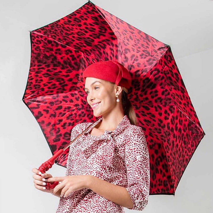 Leopard Red umbrella with leather handle by Pasotti, luxury designer rain accessory.