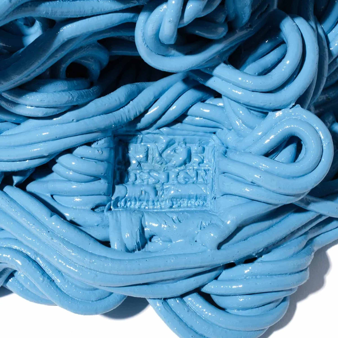 Base detail of Spaghetti Special Extra Colour light blue resin vase by Gaetano Pesce for Fish Design, expressive contemporary designer vase.